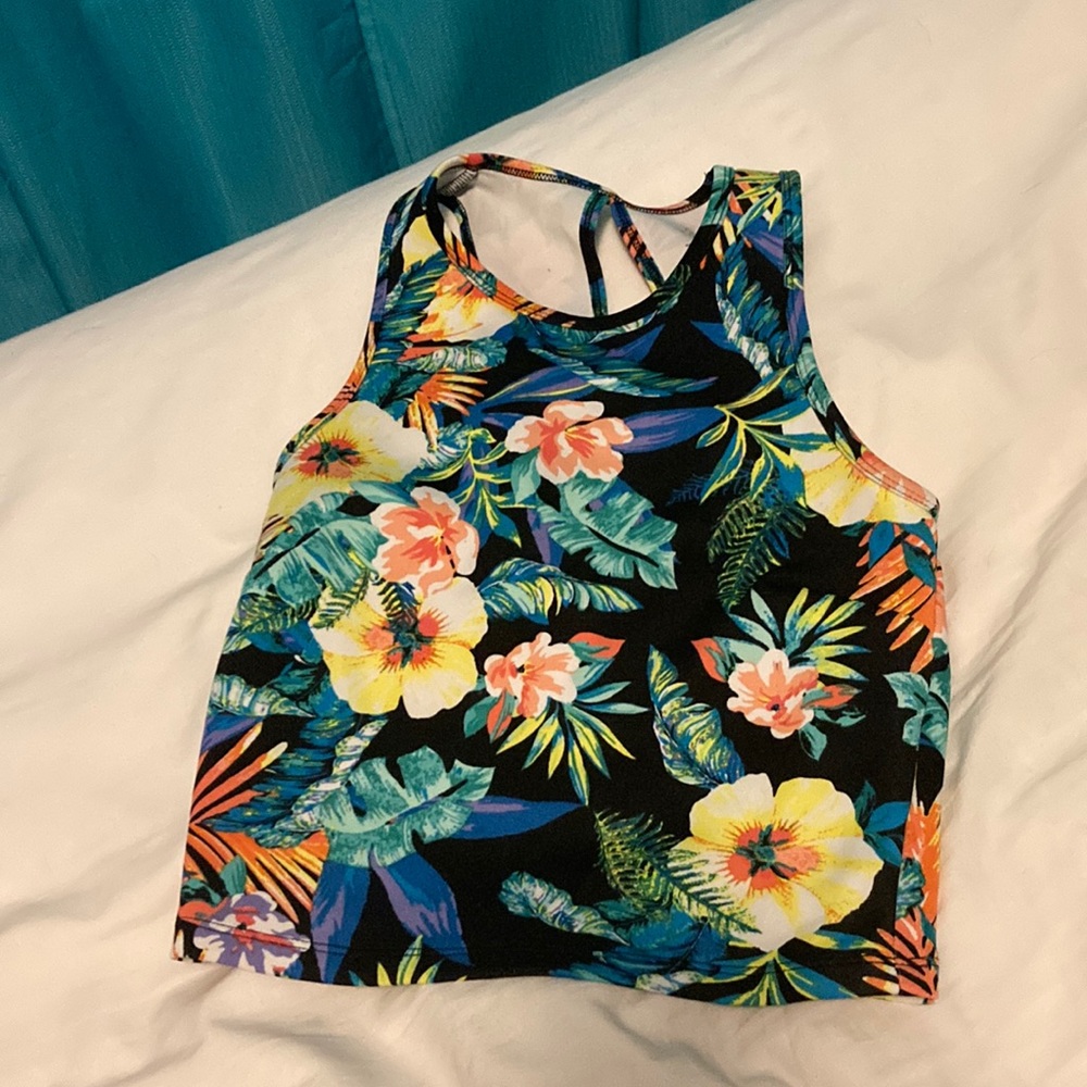 Floral workout top with a black background